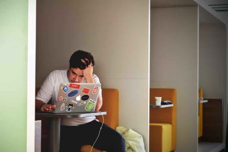 A man studying at a computer